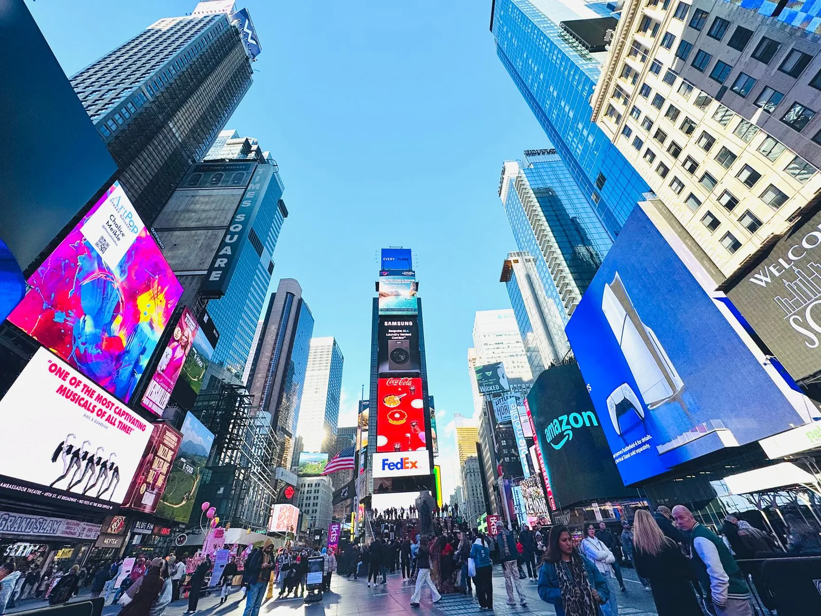 Crowds and digital billboards in Times Square