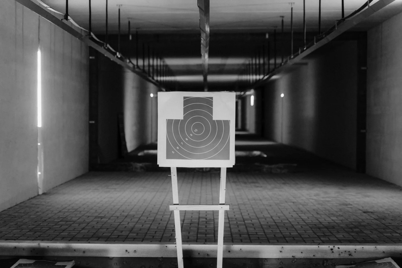 Paper target on a stand at an indoor shooting range